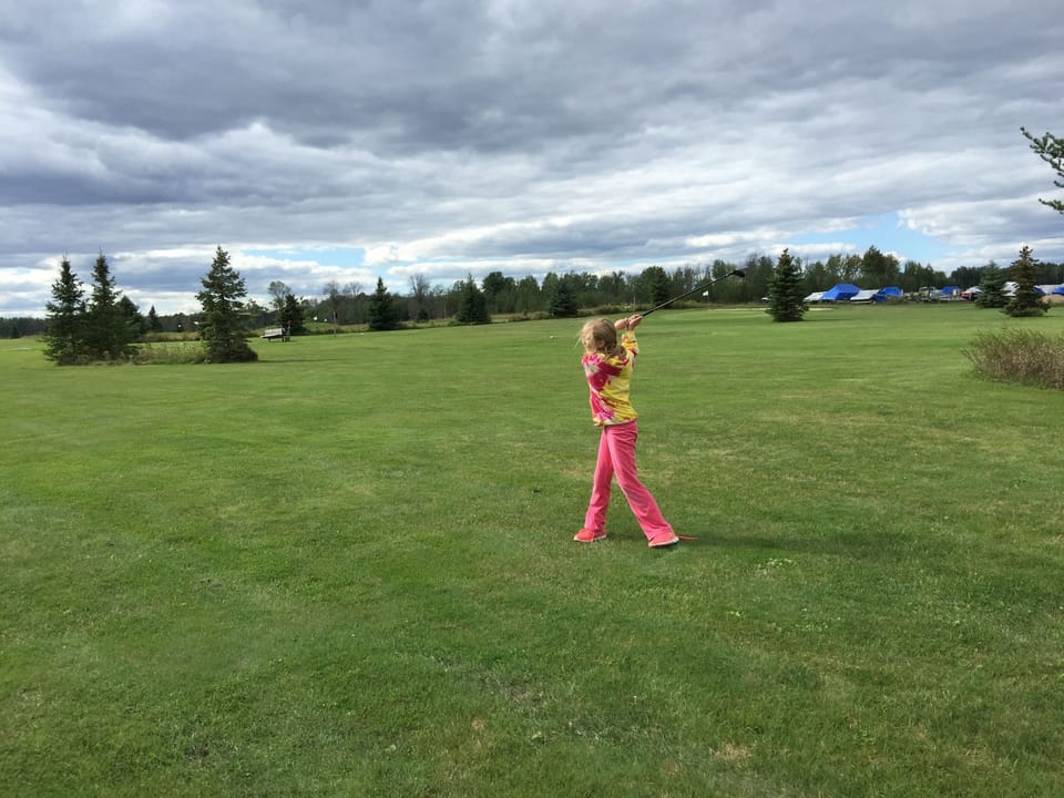 Golfing at Par 3 course a mile down the road from our cabin. The Fox Golf Course
