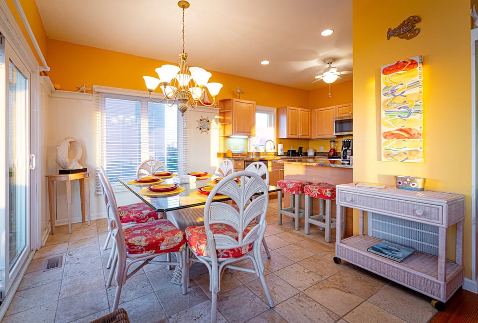 Beautiful dining room that seats 6 with two seats at the kitchen island.