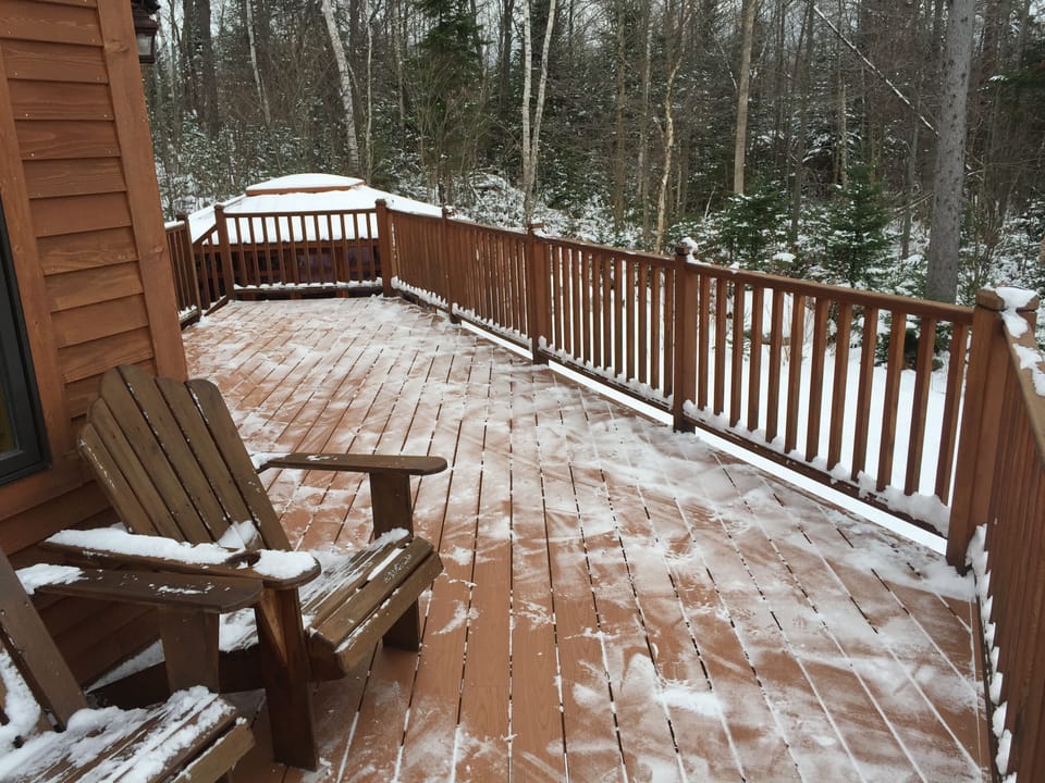 Wrap around deck in front of home.