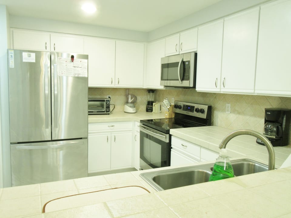 Fully equipped Kitchen provides everything needed for short or long stays