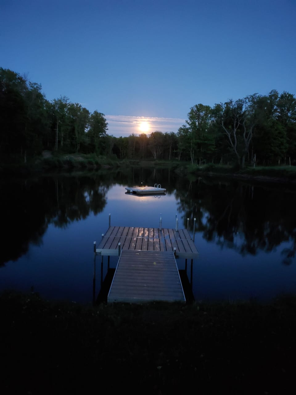 Full moon and reflections on the pond