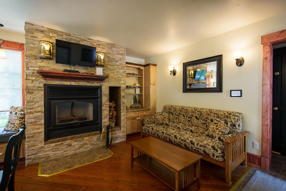 Wood Fireplace and Futon
If you are a wood fireplace person, then Inn Suite #4 is for you. There is something about the ambiance of a wood fireplace with the sounds, the smells, and the tinkering with the wood that cannot be beat.