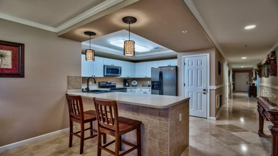 View of the kitchen from the living room. New high end appliances for cooking!