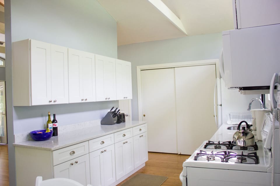 Newly renovated kitchen with quartz counters.