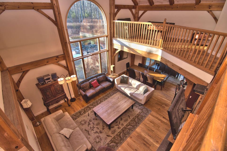 Living Room overlooking view from 2nd story - all located on 25 acres!