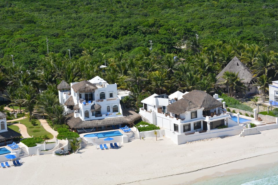 Casa del Secreto, pictured right, lies on the immaculate beach, Playa del Secret