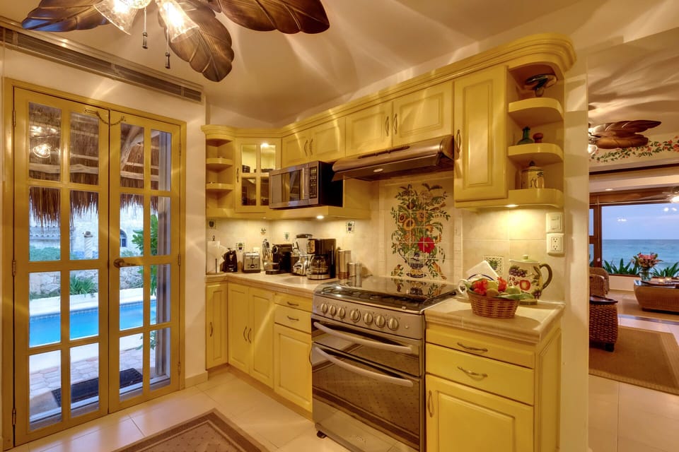 1st floor kitchen which walks directly out to pool area!