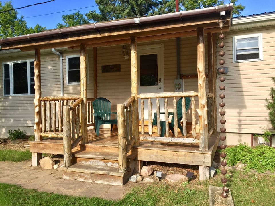 Log front porch with rain chain, so extra peaceful even on a rainy day!