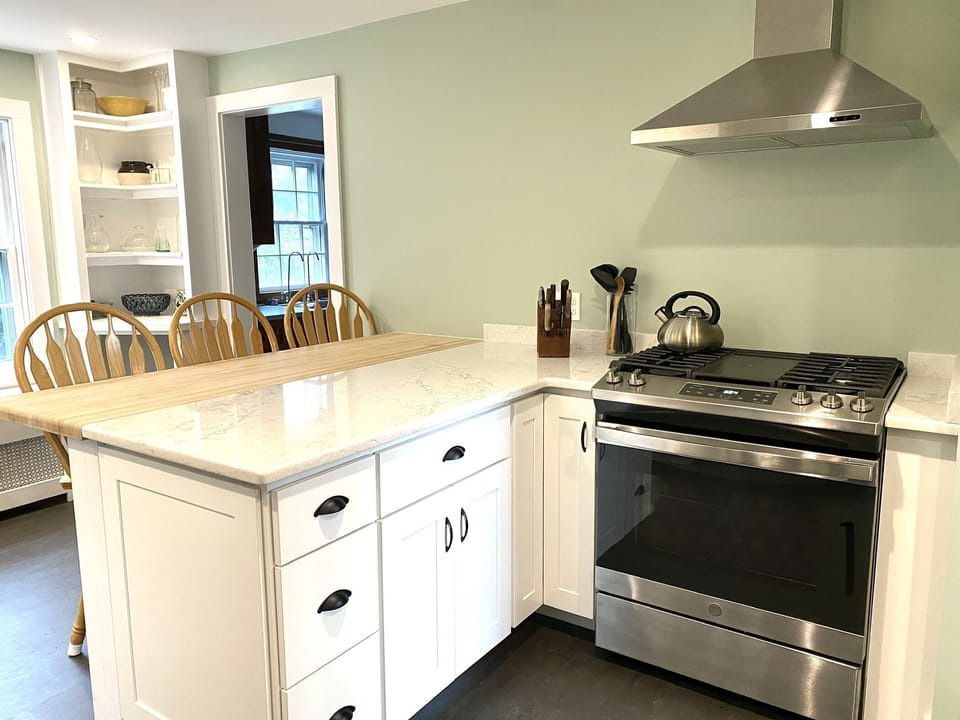 renovated kitchen seating and stove