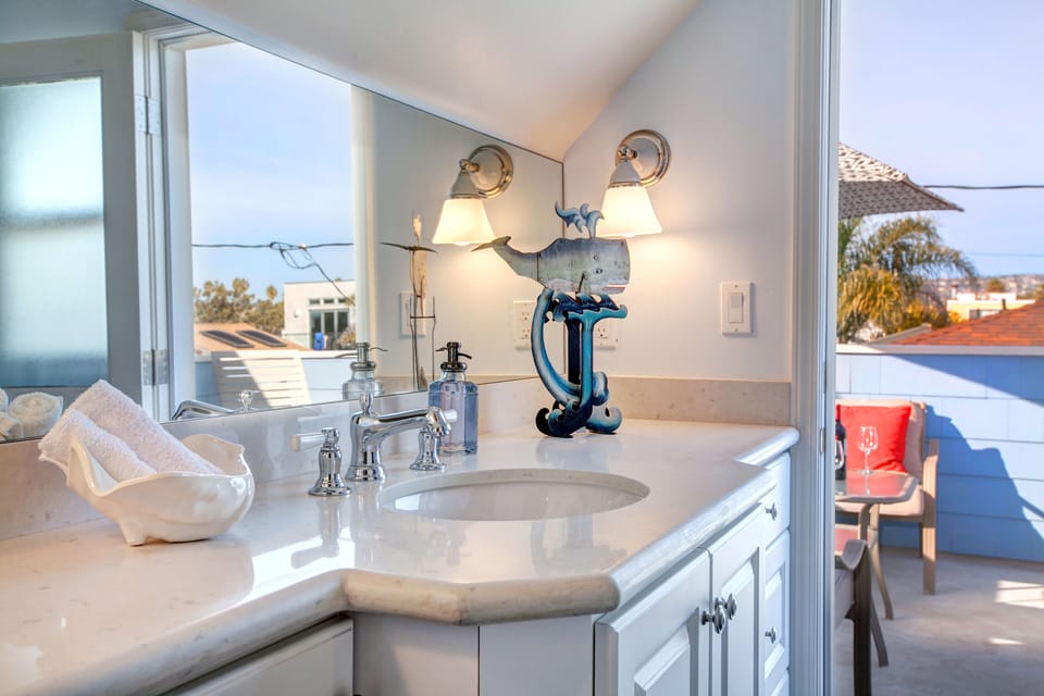 3rd floor bathroom with access to balcony
