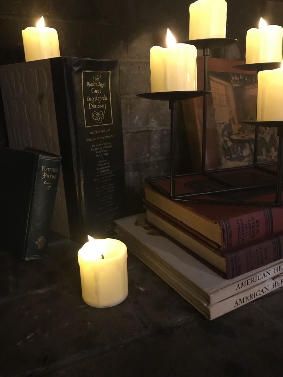 Timed self illuminating LED candles in the hearth for an evening soft glow. 