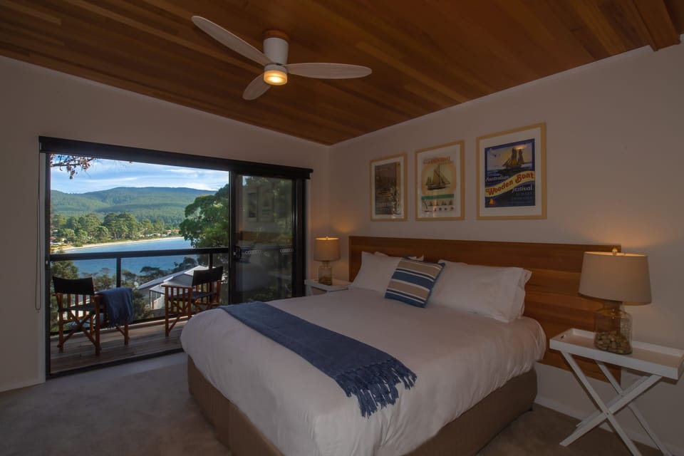 Bedroom 1 with king size bed, sliding doors to the deck and full size closets 