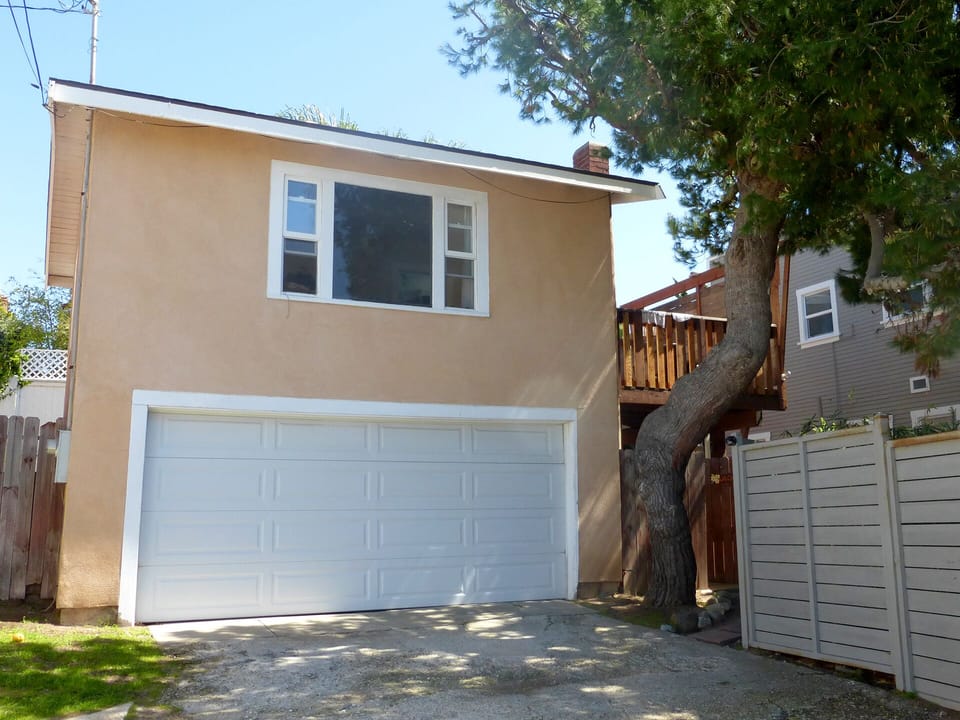 Front of home. Garage parking for one vehicle.