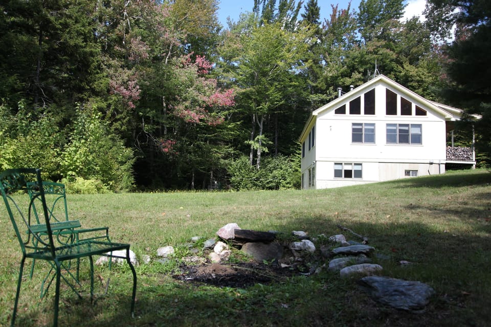 View of the house and outdoor firepit