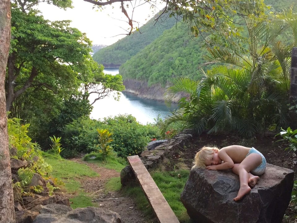 Relaxing with Trouya Cove in the background