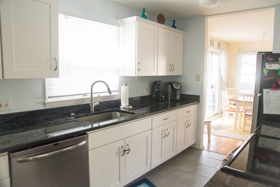 Updated kitchen with new appliances and granite counter-tops. 