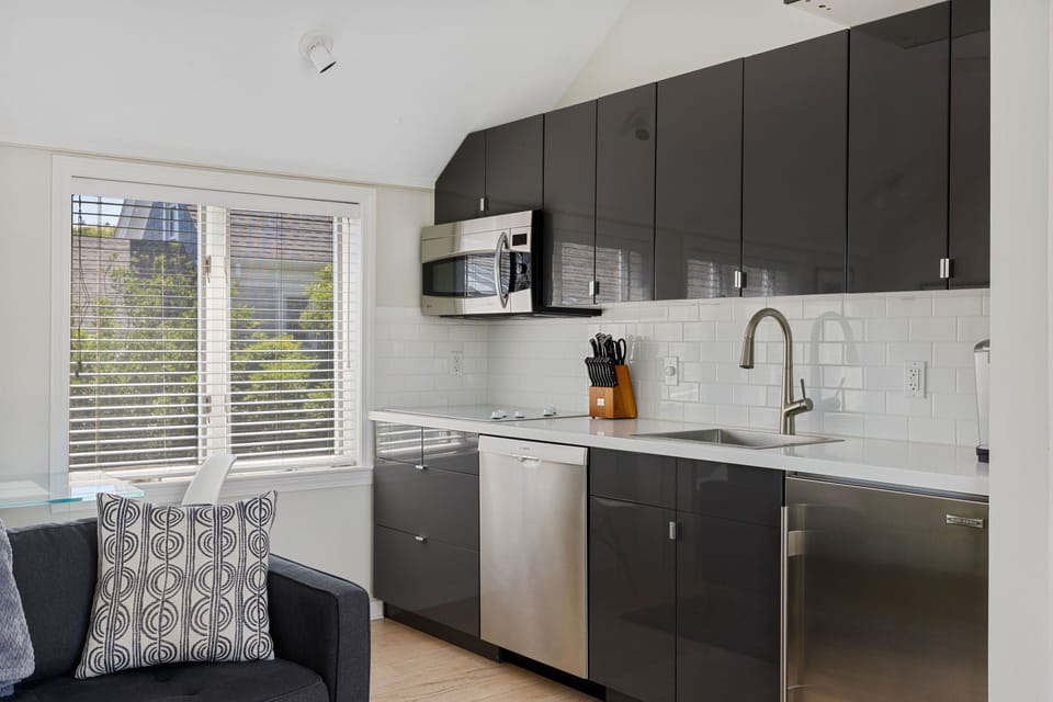 Fully stocked, modern kitchen with all of the conveniences of home