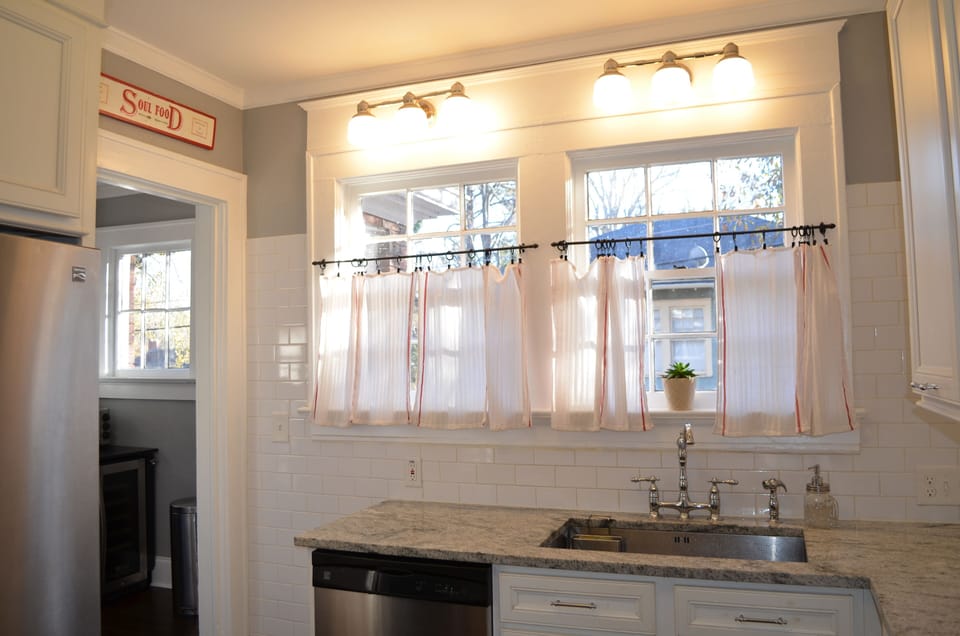 The kitchen is updated, but retains its early 1900's character.  