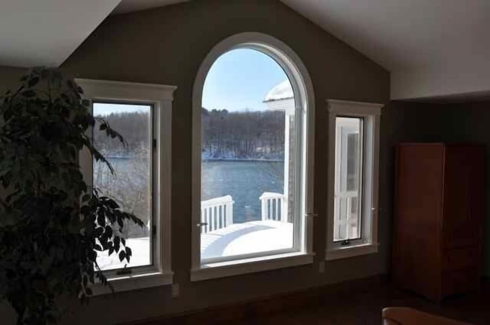 Living room overlooking small deck.
