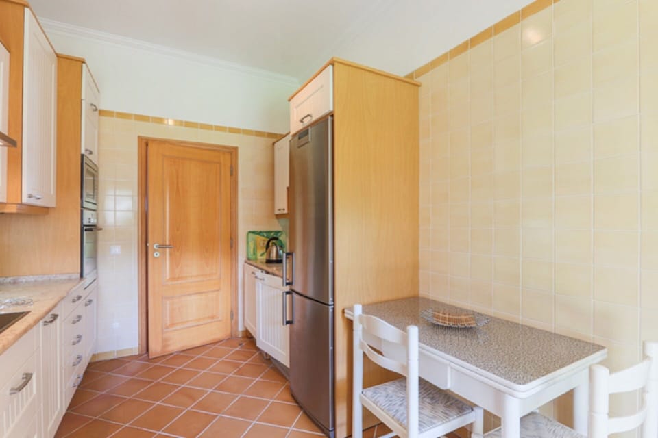 Kitchen is equipped with washer, dryer, fridge, dishwasher, stove and oven