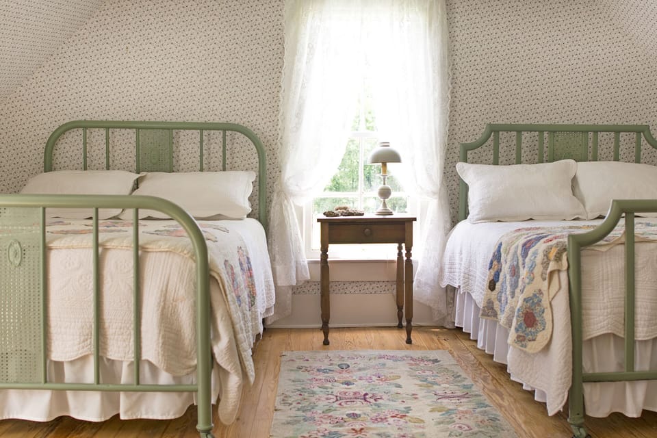 The upstairs bedroom with two double beds