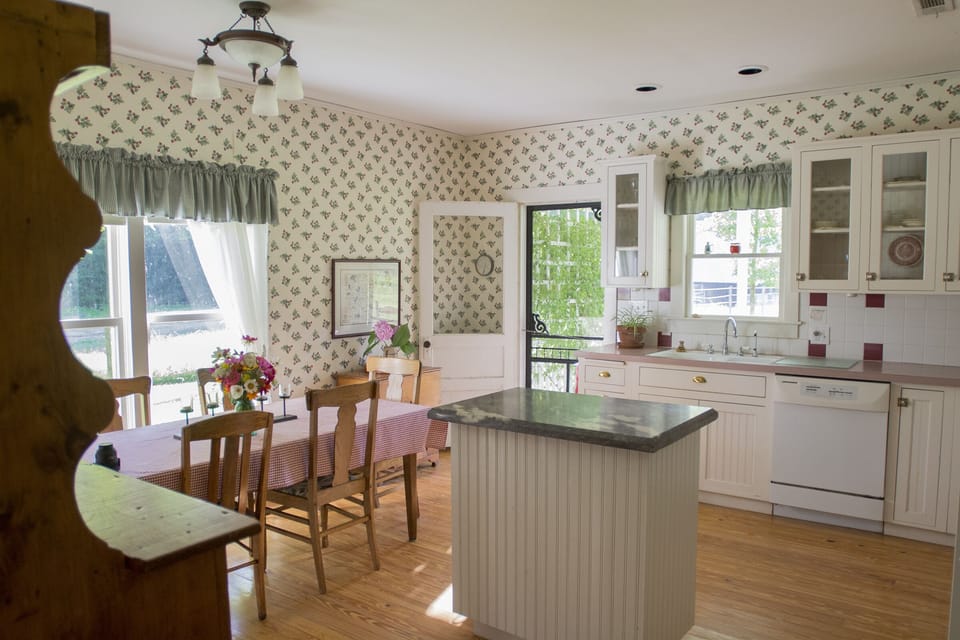 The farmhouse kitchen is fully equipped for cooking and dining