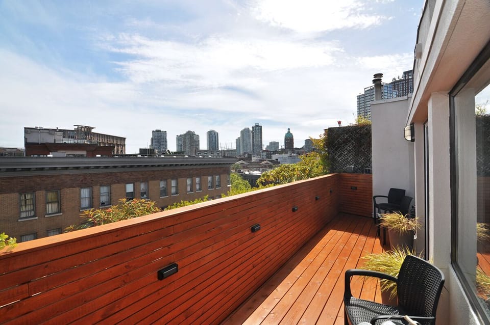 Private 200+ square foot deck drenched with afternoon sunshine.