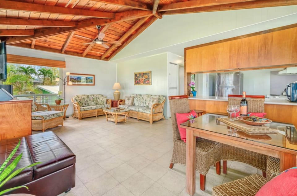 NH living - Welcome to Na Hokus open beam style living area with tropic views of mountains and Hanalei bay.