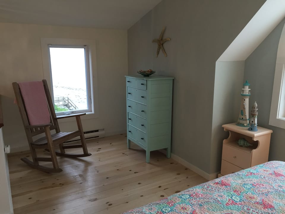 Relax in the third floor suite with half bath