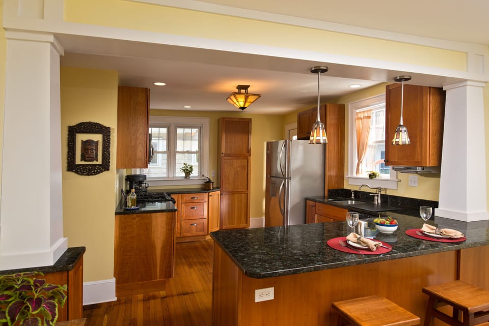 Modern kitchen with new appliances and breakfast bar
