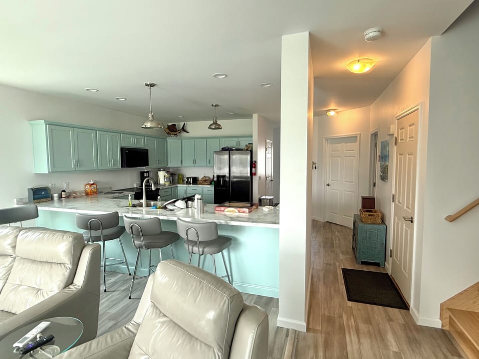 Barstools and plenty of kitchen counter space