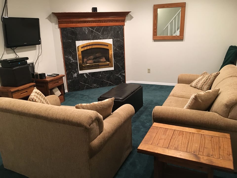 Spacious rec room with Pull Out couch (full) and Pull Out chair (single)