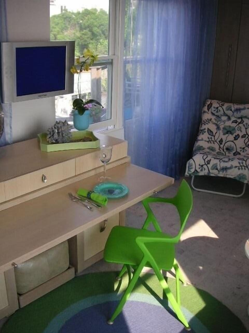 ...turns into indoor dining (credenza has pull out eating area)
