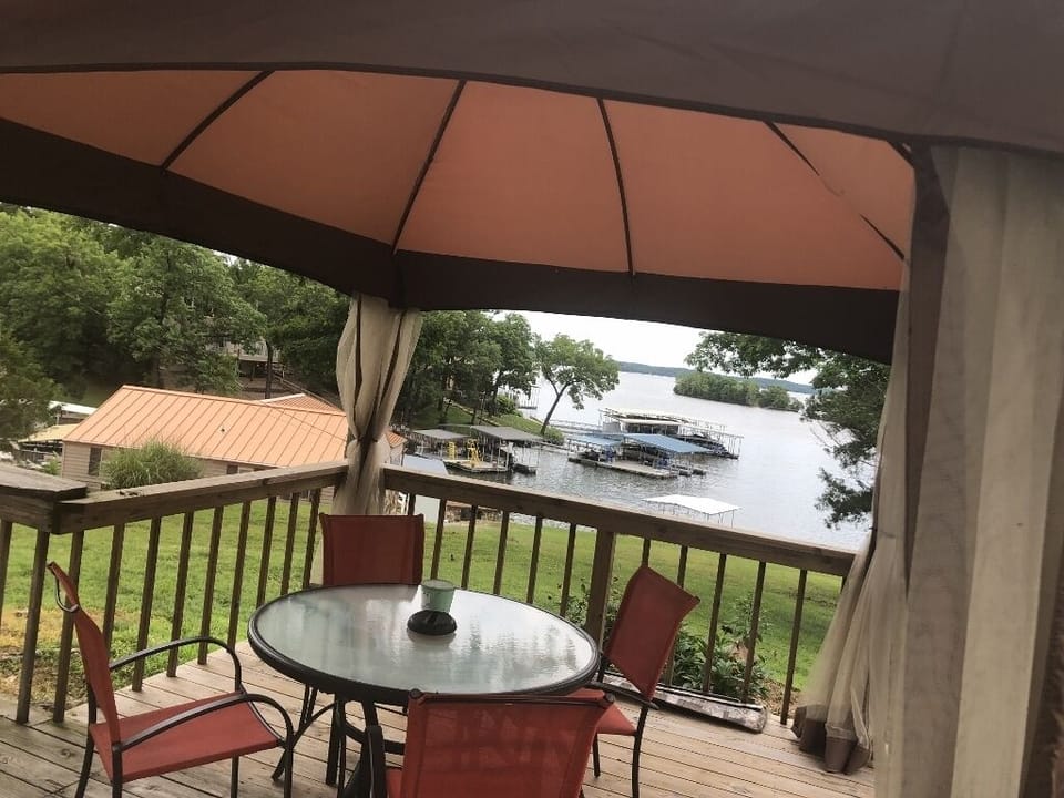 Your private deck with covered seating/eating area
