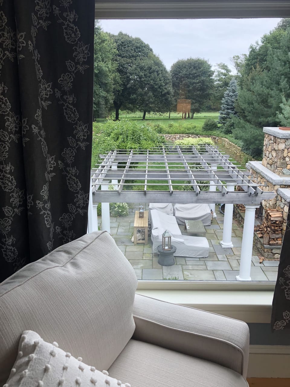 View from sunroom to backyard
