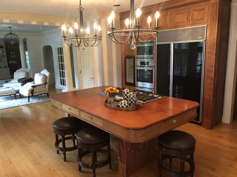 Chef’s kitchen with counter seating