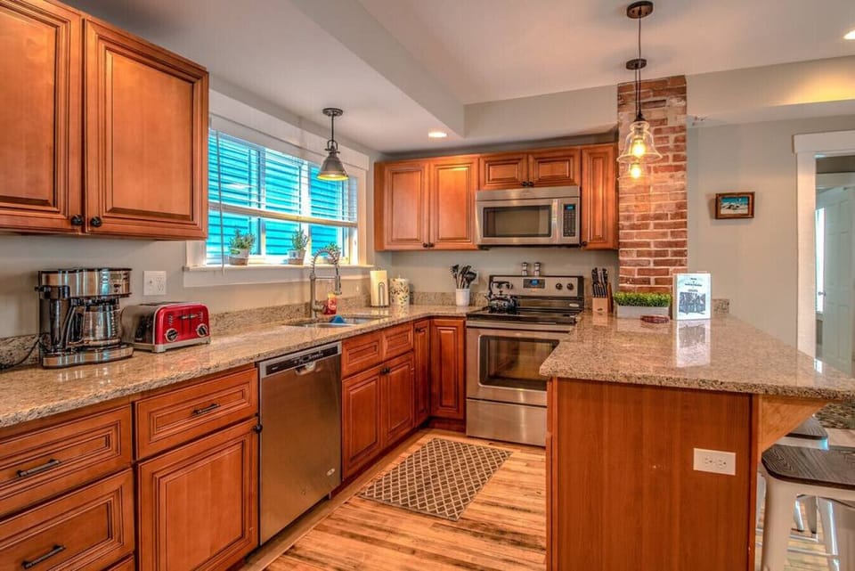 two stocked kitchens and outside grills to cook