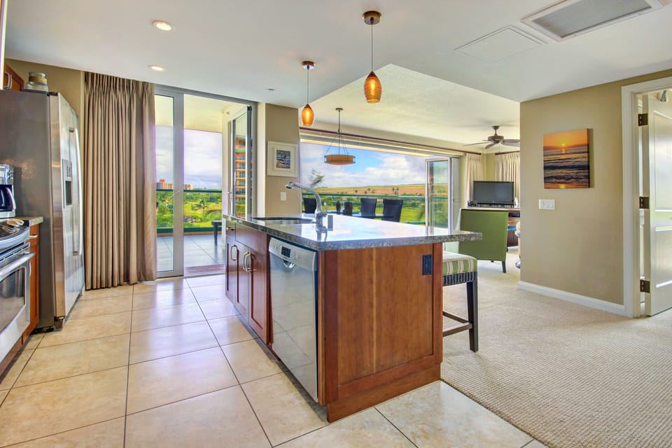 Kitchen view to outside lanai and living room
