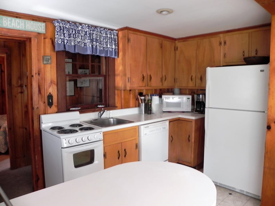 Kitchen and entrance to back part of home.