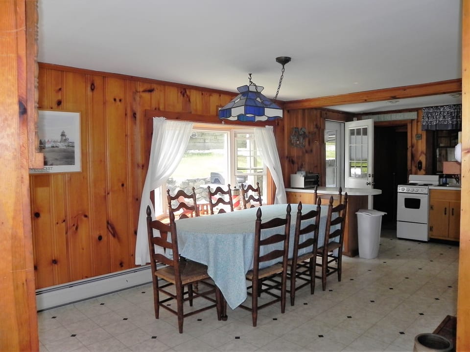 Dining area and kitchen, from living room.