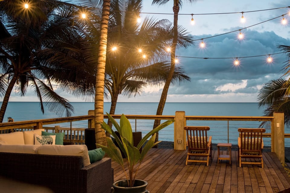Our hardwood deck sits atop our seawall, offering the ideal Sandy Beach vantage.