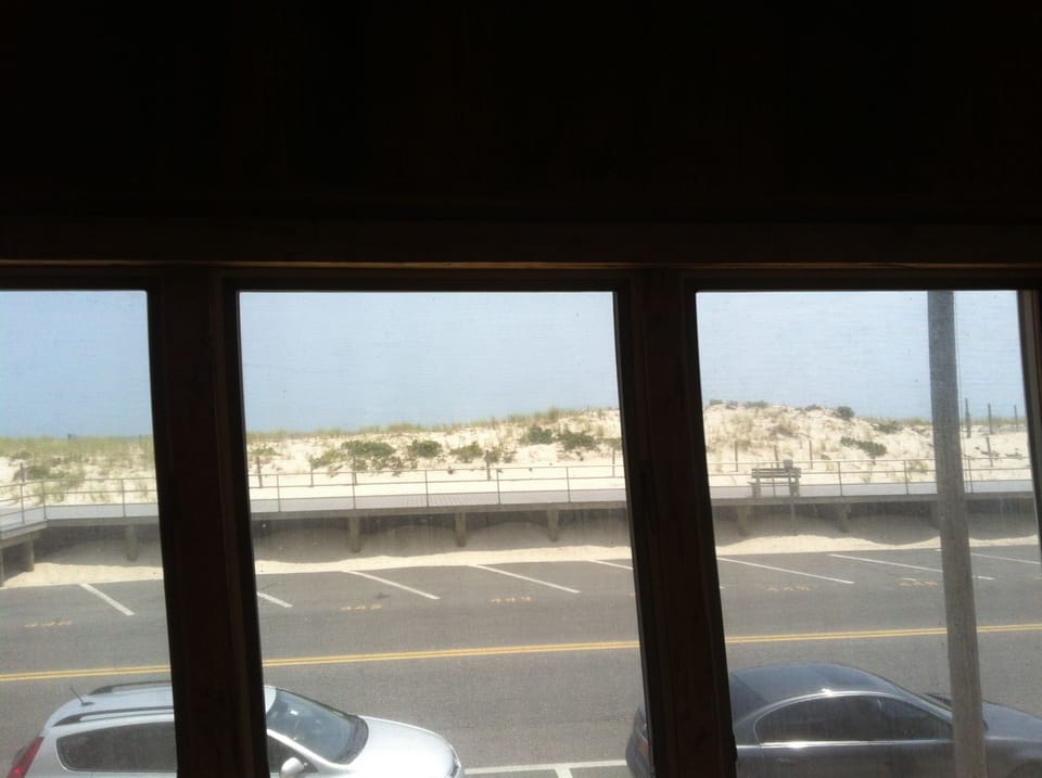 Watch the Marathon Runners, Bike Riders, and Beach Goers ! ! Plenty of Parking