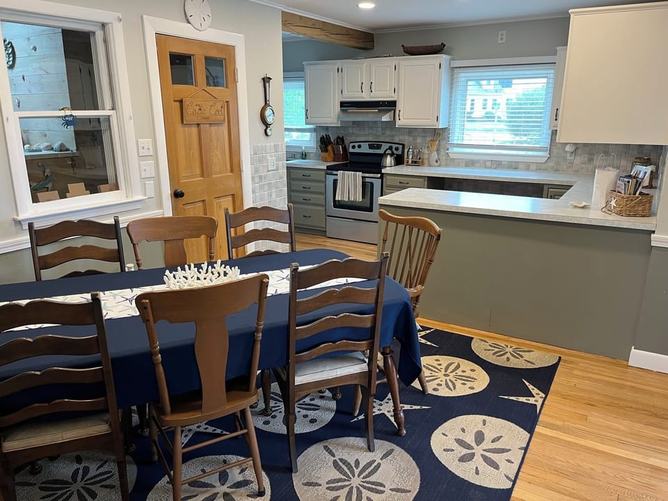Dinging room with hall and walkthru to living room.