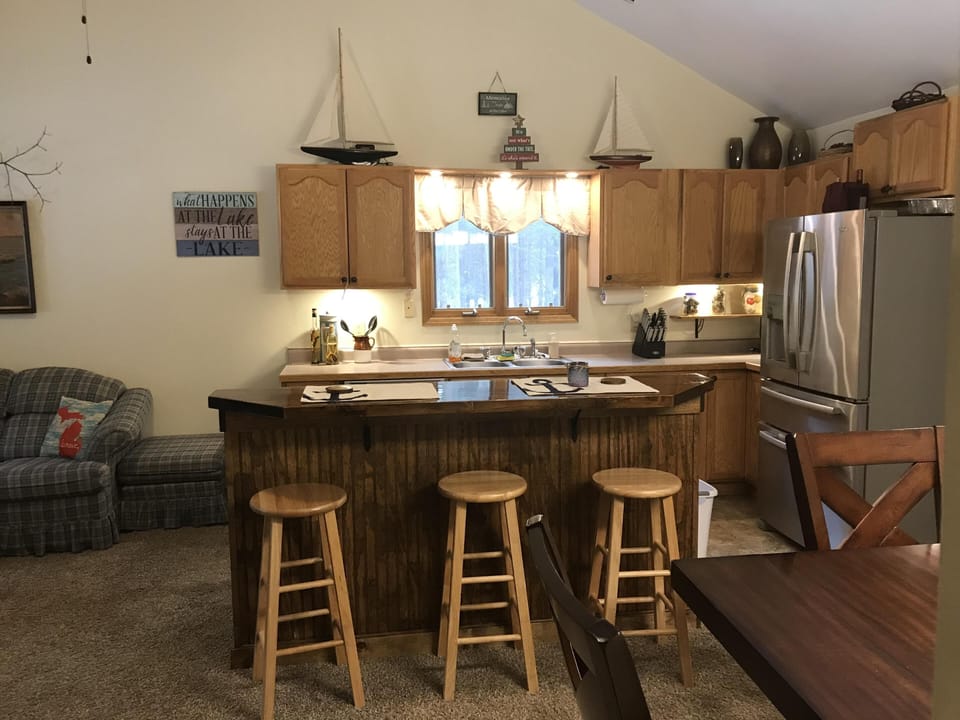 Kitchen area with bar