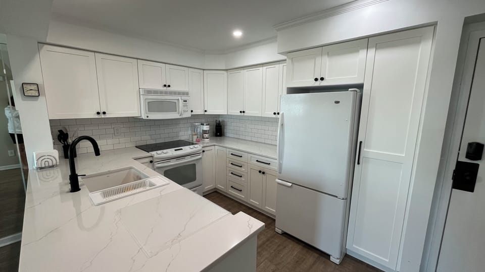 Updated Kitchen, quartz counters and ample storage