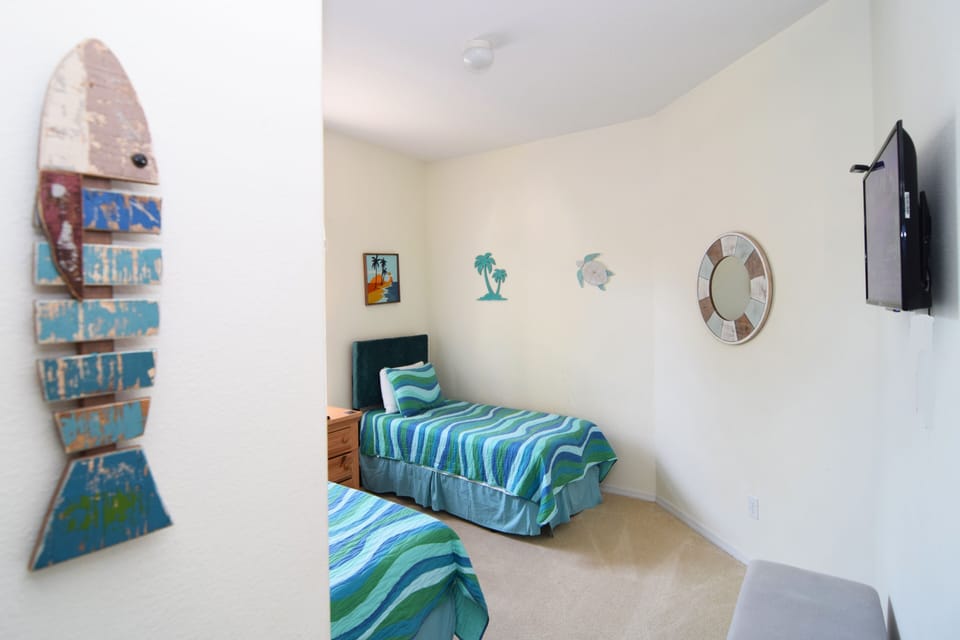 Twin bedroom with a fun beach theme