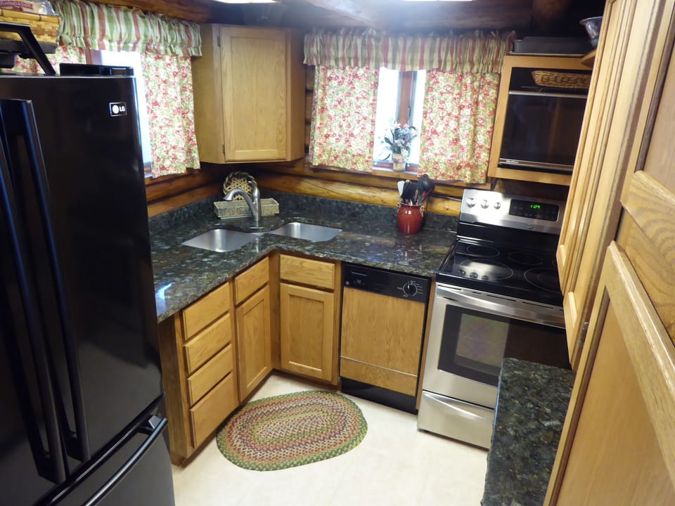 Kitchen is fully equipped, & there are two auxiliary areas to expand preparation