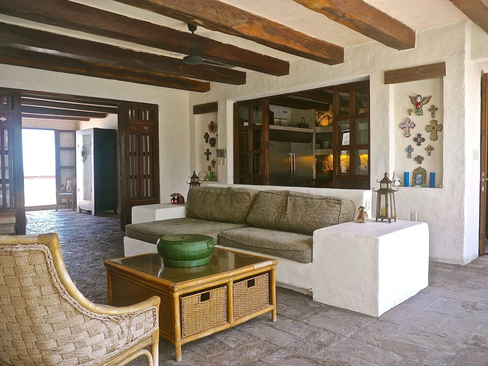 Livingroom opens to kitchen, pool and master suite.