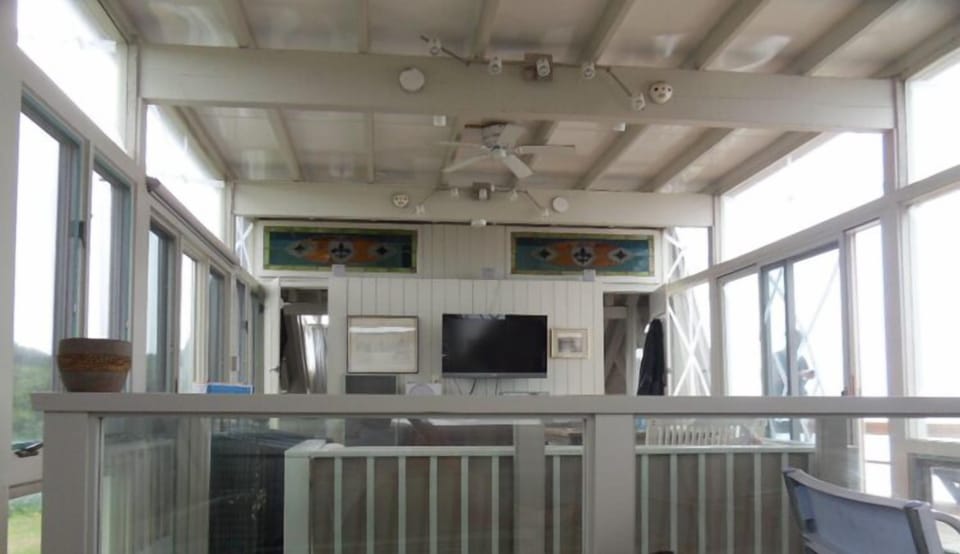 Open upstairs, windows all around and ocean view