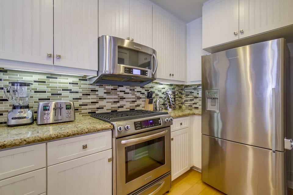 Modern Kitchen with stainless appliances.